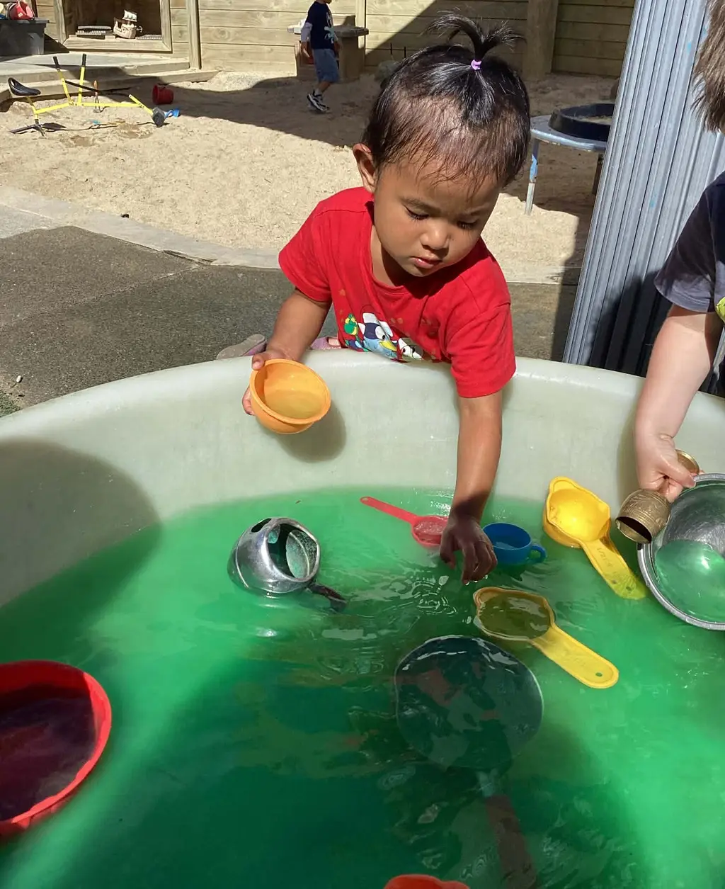 Children enjoying water play at Highfield Haven